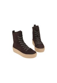 Brown suede ankle boots with brown laces, ribbed beige sole, and side zipper for easy wear. Features a rounded toe design.
