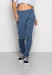Ellesse NERVET TRACK PANT - Calças de fato de treino - blue