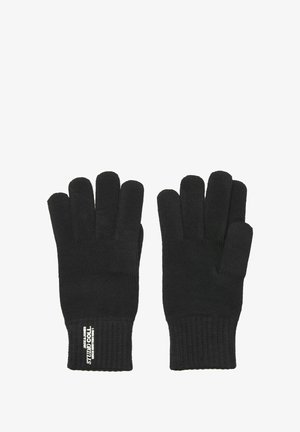 Gants tricotés noirs avec cinq ouvertures pour les doigts, poignets côtelés et une étiquette de logo au niveau du poignet. Texture douce et design simple.