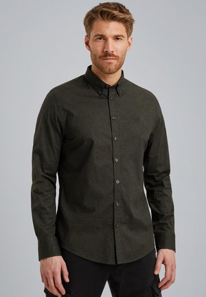 Donkergroen button-up shirt van een textuurstof, met lange mouwen en een klassieke kraag. Heeft knopen aan de voorkant en een slim fit ontwerp.