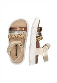 Bronze, silver, and leopard-print straps with a padded footbed. White sole with textured pattern. Adjustable ankle strap for fit.