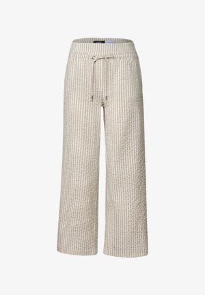 Pantalones de pierna ancha beige con una tela texturizada, que presentan rayas blancas verticales, una cinturilla elástica y un cordón para el ajuste.