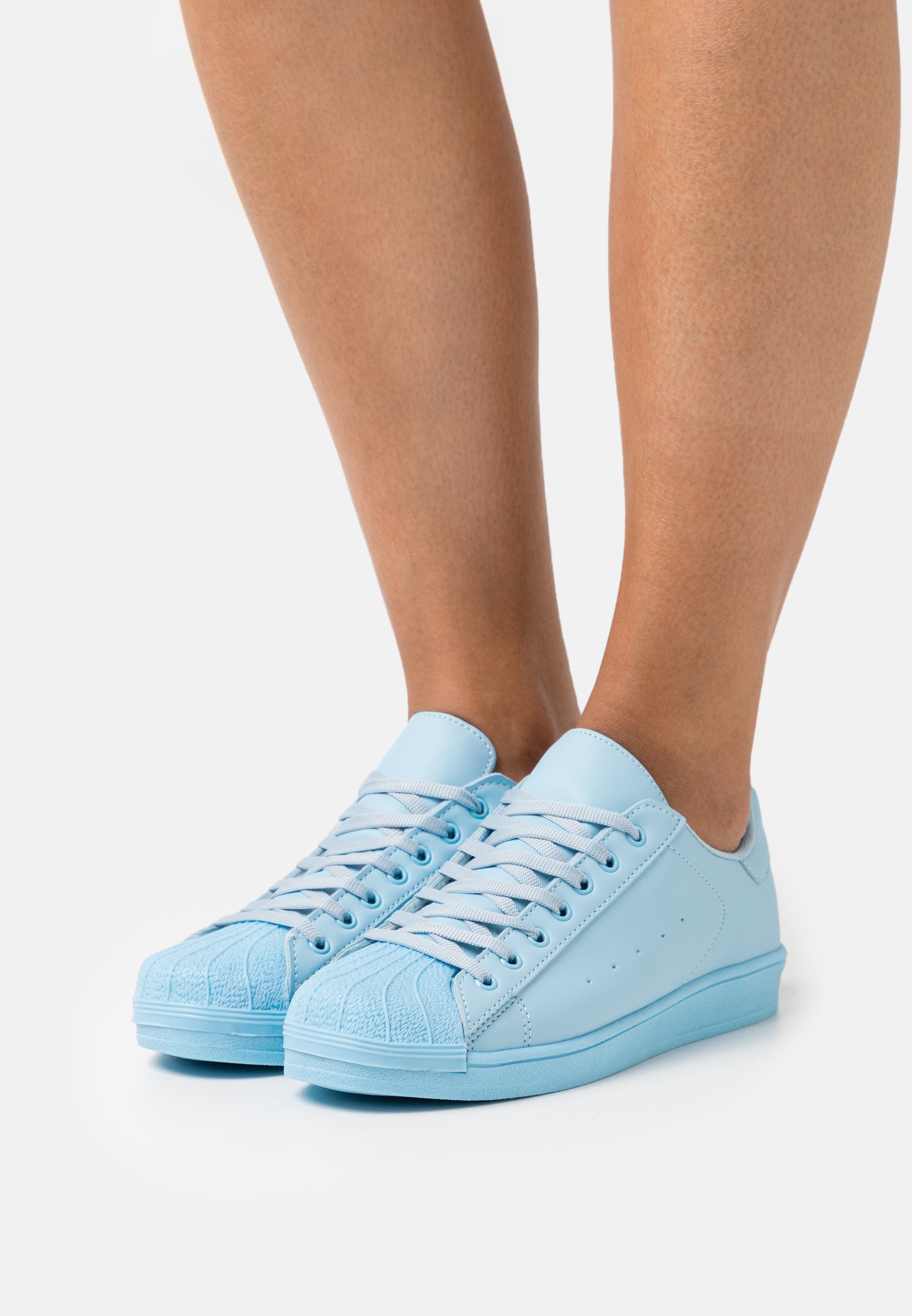 pale blue trainers