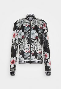 Černá bomber bunda s květinovým vzorem bílých a červených ibišků, žebrované manžety a lem, zapínání na zip a pásek s logem na spodní straně.