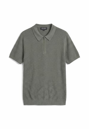 Muška siva pamučna polo majica kratkih rukava s teksturiranim uzorkom otvorene tkanine i prednjim patentnim zatvaračem ispod ovratnika.