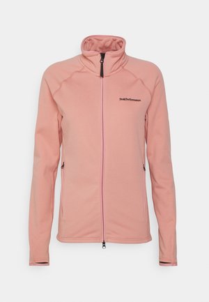 Chaqueta de forro polar rosa claro con cremallera completa, cuello alzado, mangas largas, bolsillos laterales con cremallera y el logo "Peak Performance" en el pecho.