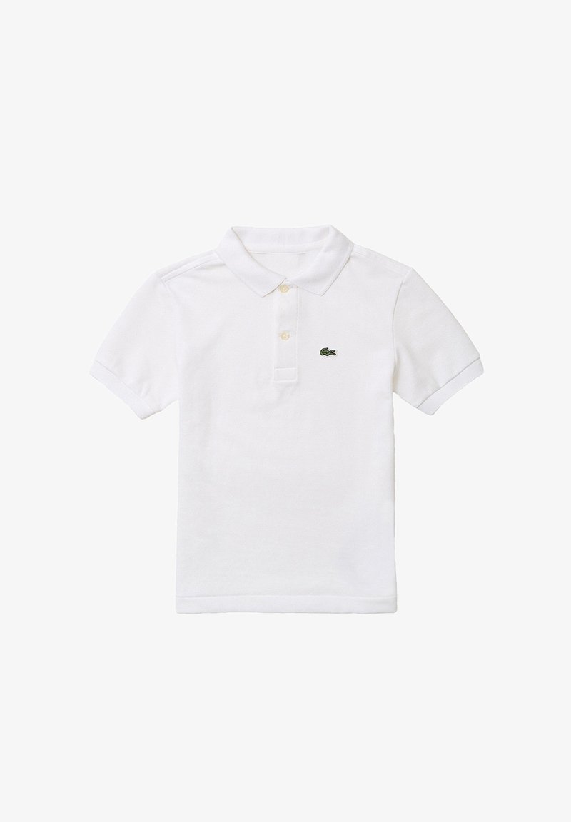 Polo blanc à manches courtes avec patte de boutonnage à deux boutons et petit logo crocodile vert sur le côté gauche de la poitrine.