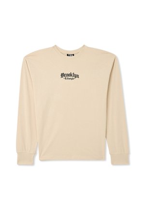 - Bluzka z długim rękawem