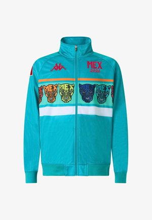 Giacca da track con zip di colore blu chiaro, caratterizzata da un audace design a righe con grafiche di animali a motivo, dettagli rossi e testo ricamato.