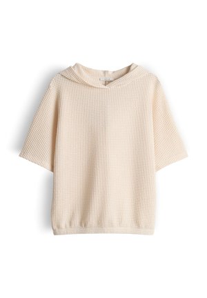 Cremefarbener Strick-Hoodie mit kurzen Ärmeln, strukturiertem Waffelmuster und elastischem Saum, auf weißem Hintergrund präsentiert.