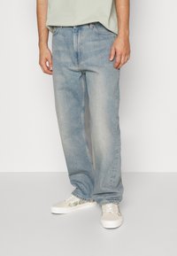 Weekday GALAXY LOOSE STRAIGHT UNISEX - Calças de ganga folgadas - light worned blue