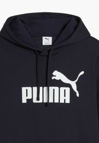 Sweatshirt à capuche bleu marine en coton mélangé. Présente un grand logo blanc "PUMA" et une silhouette de puma bondissant à l'avant.