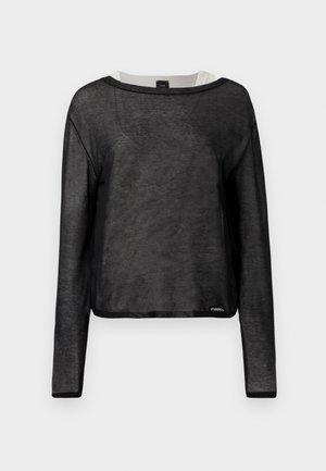 Black long-sleeve top with a loose fit, made of sheer fabric. Features a round neckline and contrasting white trim, with a small logo at the hem.