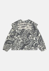 Langermet topp i krem med mørk blå blomster paisley-mønster, med volangskuldre og en samlet bakside med blonder.