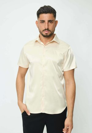 UNIE CLASSIQUE ET OSÉE À MANCHES COURTES - Chemise - beige