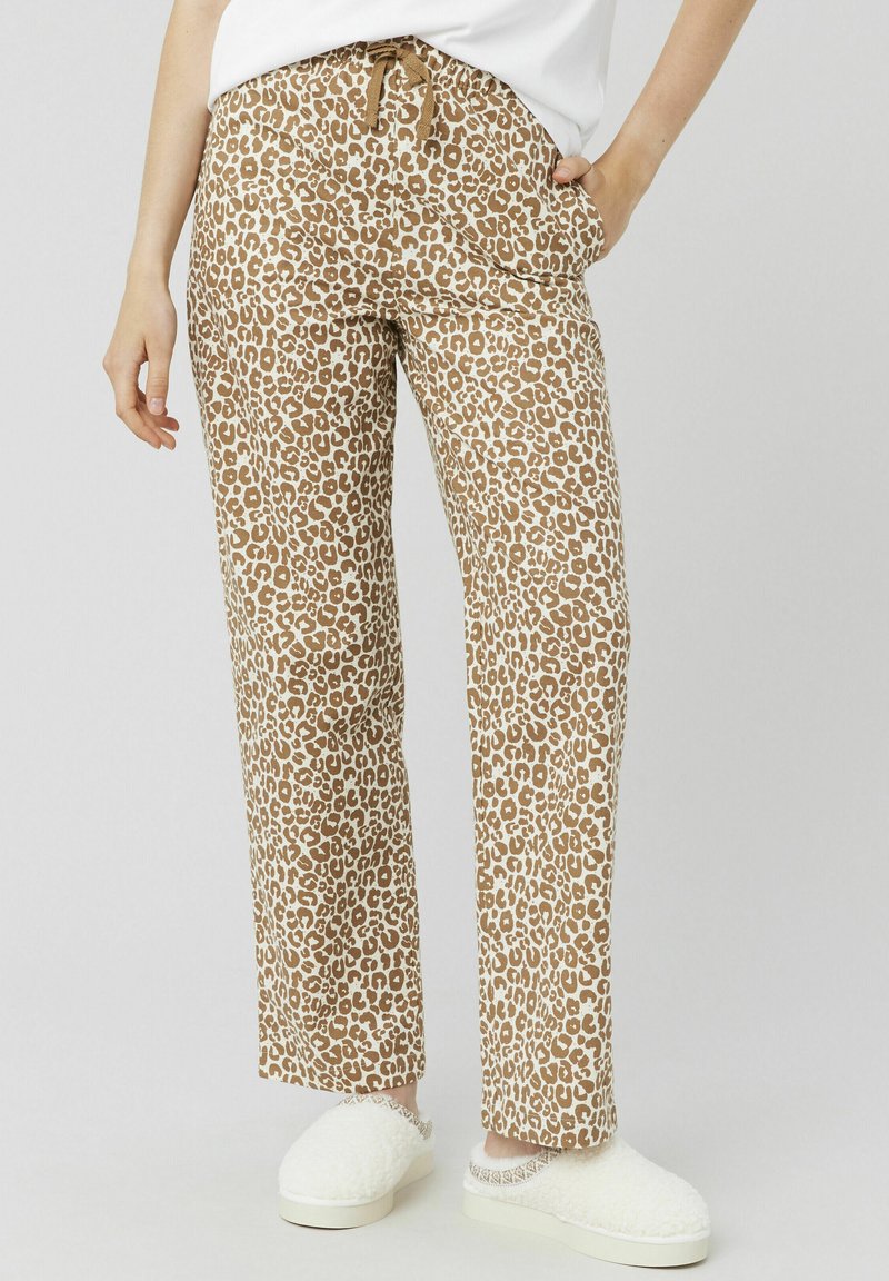 Pantalons en imprimé léopard dans des tons de brun clair et crème, dotés d'une taille élastique avec cordon de serrage. Tissu lisse avec une coupe décontractée.