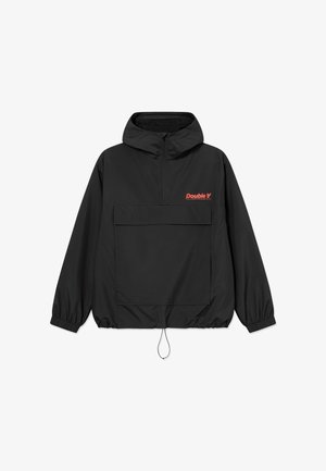 Black windbreaker jacket with a half-zip, front pocket, and elastic cuffs. Features "Double V" logo in orange on the chest.