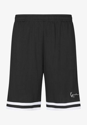 Pantalones cortos deportivos negros con cintura elástica, franjas blancas y negras cerca del dobladillo y un pequeño logo blanco de la firma en la parte inferior de la pierna derecha.