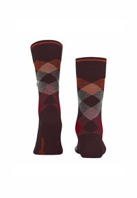 Chaussettes marron avec un motif argyle vibrant en rouge, orange et gris. Le haut du revers est uni marron et arbore le logo de Burlington.