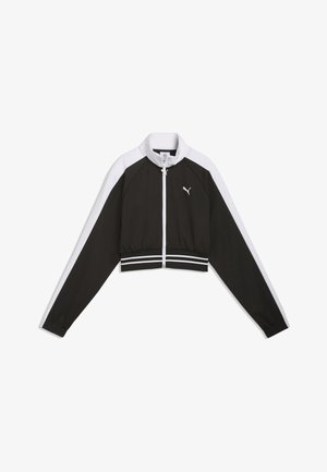 Svartvit kort jacka med dragkedja, långa ärmar och ribbad nederkant. Har kontrasterande paneler och en liten logga på bröstet.