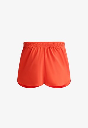 Ljusa orangea träningsshorts med resårmidja och ett glatt, lätt tyg. Har en lös passform och rundad fåll.