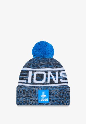 Gestreifte Mütze in Blau und Schwarz mit einem weißen "LIONS" Logo und einem blauen Bommel oben; besitzt ein strukturiertes Muster und ein quadratisches Etikett.
