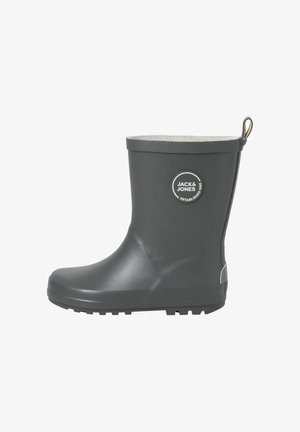 Grå gummistøvel til ankelen med teksturert trim, utstyrt med et rundt logo-patch på siden og en pull-tab bak for enkel påkledning.