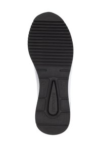 Black rubber shoe sole with horizontal grooves and ridges. Center features a circular logo. Color contrast with upper shoe's white material.