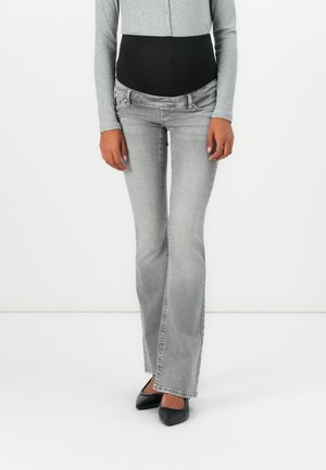 Gray flared jeans with a dark black waistband, featuring light fading and two front pockets. The fabric is denim with a smooth texture.