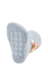 Light blue sock with a cartoon fox design. The sole features a textured, dotted grip pattern for traction. Soft cotton material.