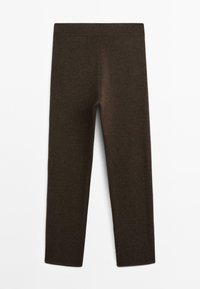 Leggings marron en tissu doux, avec une texture lisse et un design ajusté. Présentent une taille haute et une forme épurée.