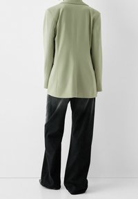 Bershka Kort kappa / rock - green