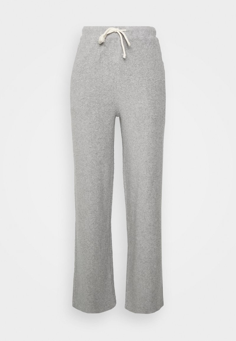 Light gray fleece sweatpants with a wide leg, elastic waistband, and white drawstring tie at the front.