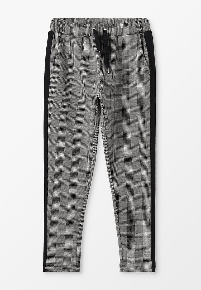 Pantalons à carreaux gris et noirs avec taille élastique, cordon de serrage et poches latérales, dotés de panneaux latéraux noirs pour le contraste.