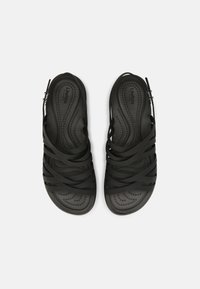 Crocs BROOKLYN STRAPPY - Sandali con plateau - black