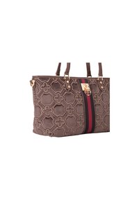 Sac fourre-tout marron texturé avec un motif floral, présentant une bande verticale bordeaux et noire ainsi que des accents métalliques dorés.