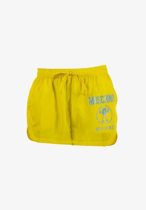 Žlté šortky Moschino Milano s elastickým pásom a predným sťahovaním na šnúrky, s modrým logom a zaobleným lemom.