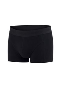Zwarte boxershorts met een gemarkeerde elastische tailleband en een aansluitend ontwerp, gemaakt van een gladde, rekbare stof.