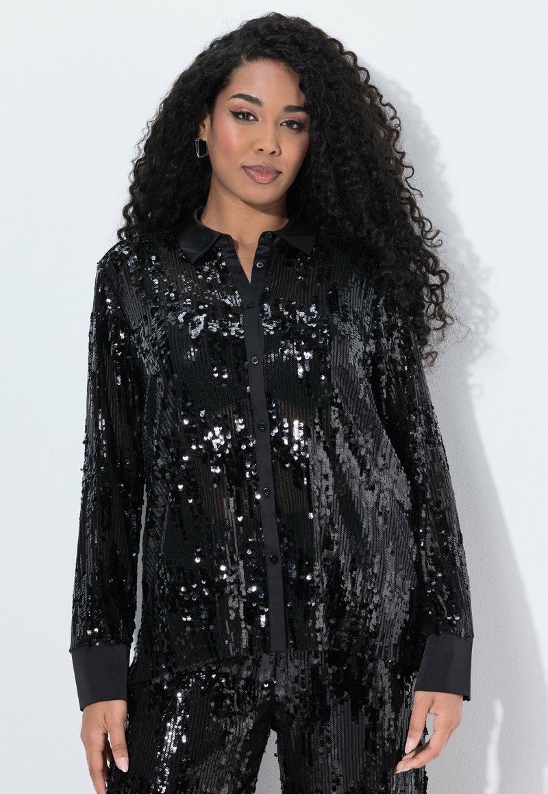 Black sequined shirt with long sleeves, button-down front, and a contrasting black collar. Shiny texture with vertical stripe pattern.