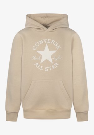 Sweatshirt à capuche beige avec poche kangourou à l'avant et logo blanc Converse All Star comprenant une étoile et le texte "Chuck Taylor".