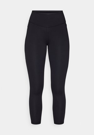 Black leggings with a high waist, smooth texture, and fitted design. Features side pockets and stitched seams for added detail.