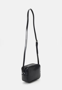 Tommy Jeans MUST CAMERA BAG SEASONAL - Cross body bag - black