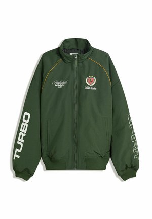 Green bomber jacket featuring a zip front, ribbed cuffs, and hem. Text on sleeves: "TURBO" and "SPIRIT." Logos on chest in yellow and red.