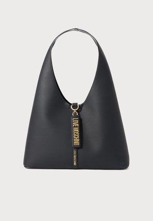 Black leather shoulder bag with a wide strap, gold hardware, and two hanging tags embossed with "LOVE MOSCHINO" in gold letters.