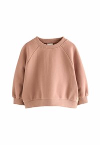 Sweat-shirt en coton rose avec des manches raglan, des poignets et un ourlet côtelés. Dispose d'une petite étiquette de logo sur le bas à gauche.
