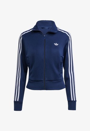 Granatowa kurtka na zamek wykonana z teksturowanej tkaniny. Ozdobiona białymi paskami na rękawach oraz małym logo na piersi. Dopasowany fason.