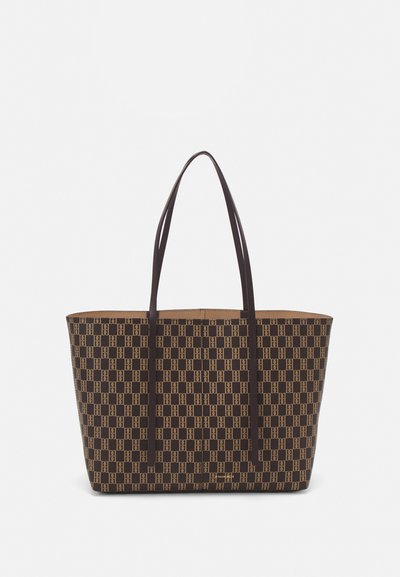 Brown patterned tote bag with a geometric design, featuring two long handles and a spacious open top. Material appears durable and textured.