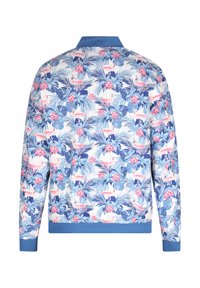 Tryckt bomberjacka med ett blommönster i blått och rosa, med en enfärgad blå krage och ribbade ärmslut, tillverkad av lättviktigt tyg.