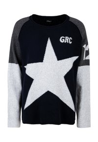 Knitted sweater in navy and gray with a large white star design, raglan sleeves, and "GRC" and "12" embroidered accents. Soft texture.