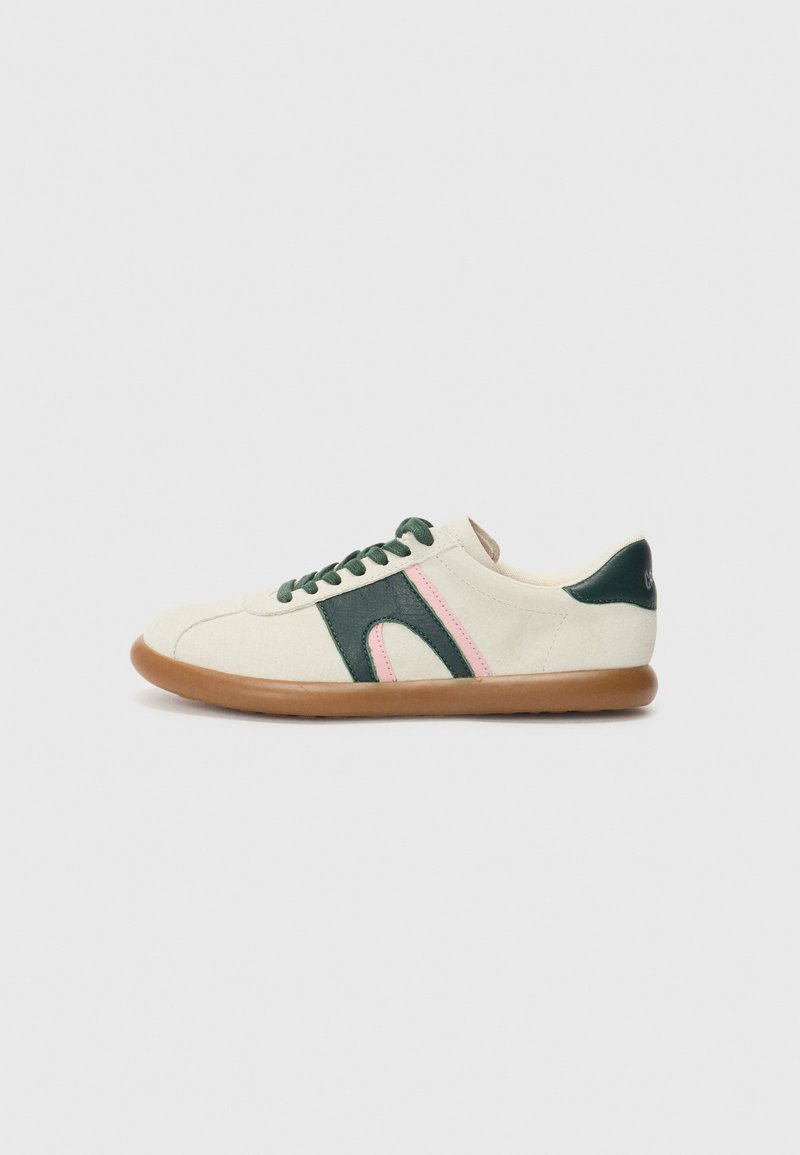 Canvas sneaker with cream upper, green and pink accents, round toe, and gum rubber sole. Features laces and soft texture.